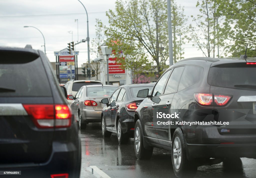 Traffic on 200 Street, Langley, British Columbia, Canada in the Rain Traffic on 200 Street, Langley, British Columbia, Canada in the Rain. Waiting in line during rush hour. The Township of Langley is a suburb in Metro Vancouver. Traffic Stock Photo