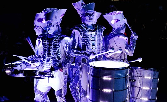The illuminated LED drummers performing at the Tall Ships Rendezvous (RDV) Event at London Greenwich 2017