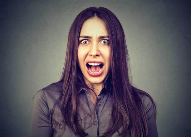 istock Annoyed angry woman screaming 678985600