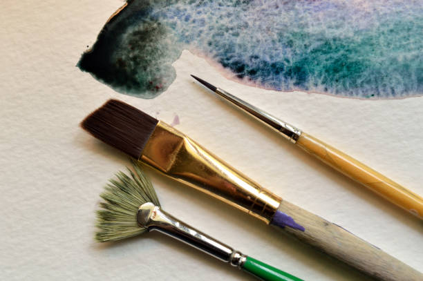 istock Watercolor technique, fluid wash and brushes 679047710