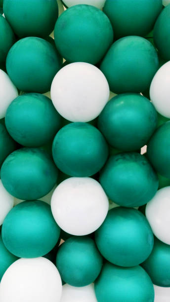 istock Green and white balloon backgrounds vertical side 679072560