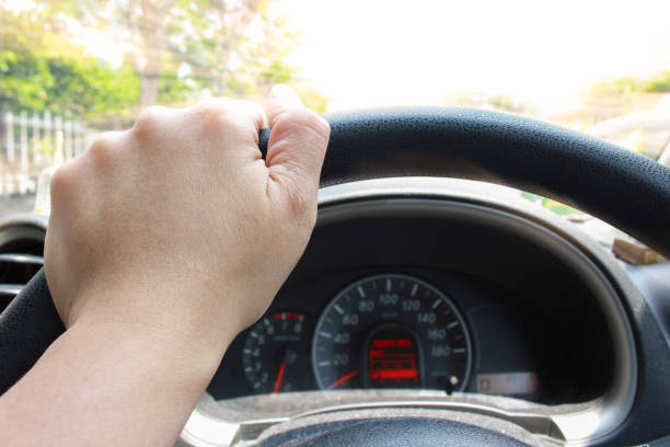 istock Driver's hands on a steering wheel of the car 679108996