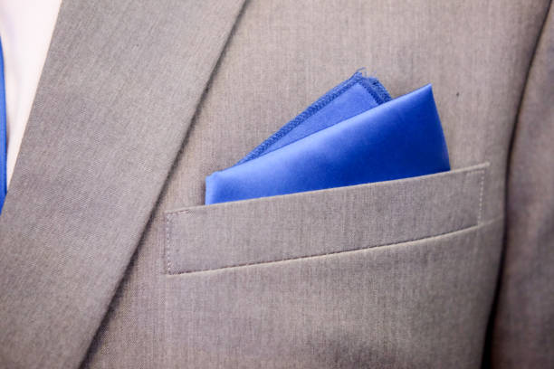 istock Blue pattern handkerchief close up in man grey suit 679130364
