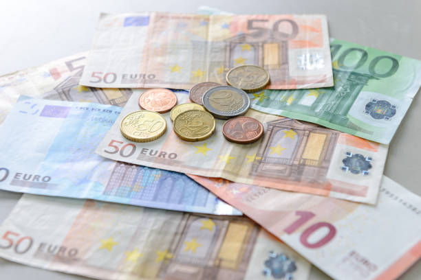 istock Money euro banknotes and coins 679142432
