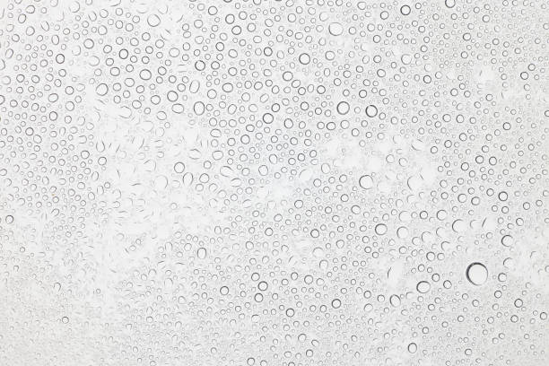 istock Water drops on glass, Rain droplets on glass background. 679184566
