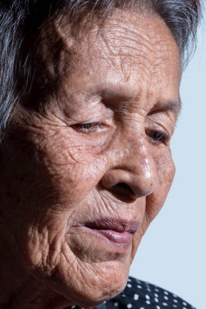 istock Lonely senior woman smiling in camera 679184682
