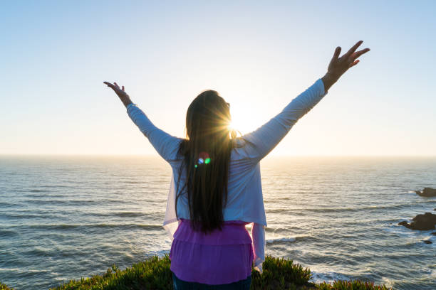 istock Woman with Lifted Hands 679201934