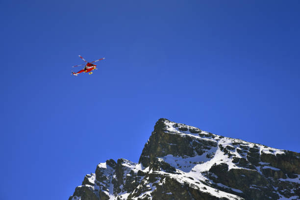 istock Rescue helicopter over the Tatra mountain peak. 679229776