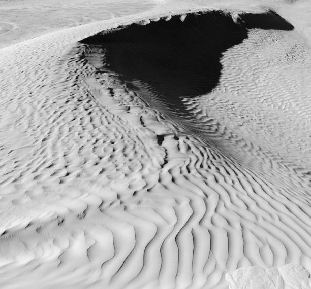 istock Black and White color (B&W). Natural texture and background of the desert. Sand patterns 679230220