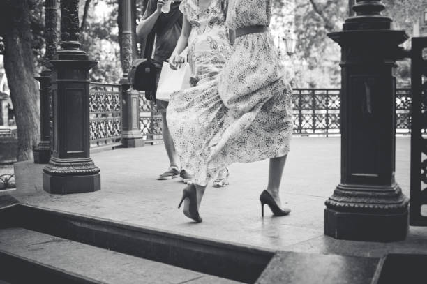 A woman in a light dress is going on a date