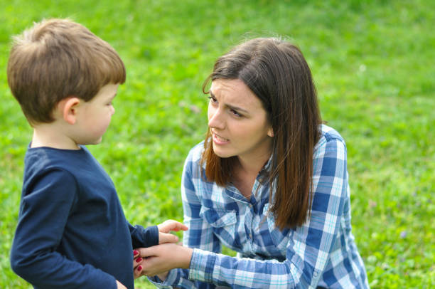istock Happy mom and son play in the park in spring. 679246520