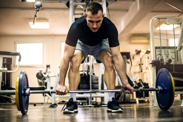 istock Bodybuilder weightlifting in the gym 679247390