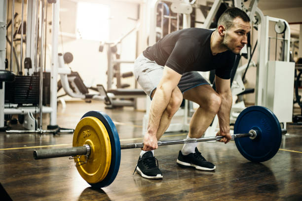 istock Bodybuilder weightlifting in the gym 679248734