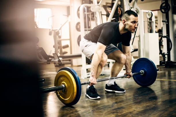 istock Bodybuilder weightlifting in the gym 679249830