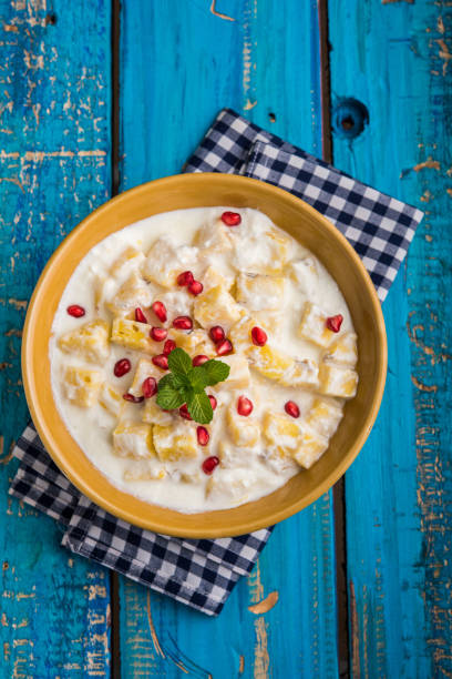 ananas or anaanaas or pineapple raita, chopped pieces of pineapple mixed with sweet curd and garnished with pomegranate and mint, favourite side dish or starter food in India ananas or anaanaas or pineapple raita, chopped pieces of pineapple mixed with sweet curd and garnished with pomegranate and mint, favourite side dish or starter food in India ananas stock pictures, royalty-free photos & images
