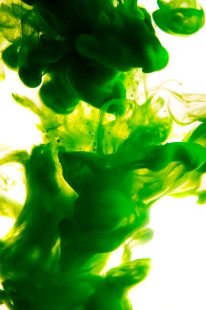 istock green ink in water isolated on white background 679269492