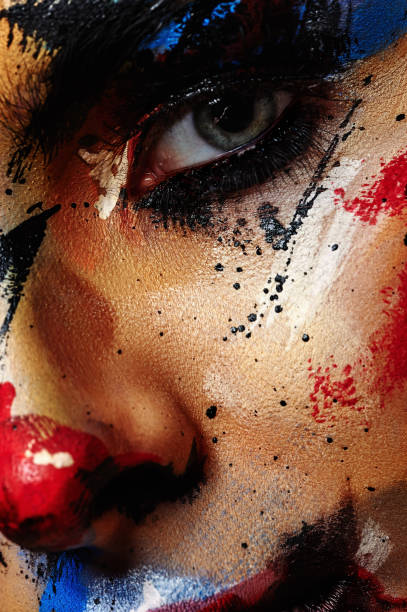 istock Artistic beauty Clown Make-up on Woman's Face 679287434