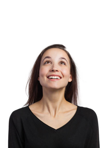 istock Cute young woman looking up 679295264