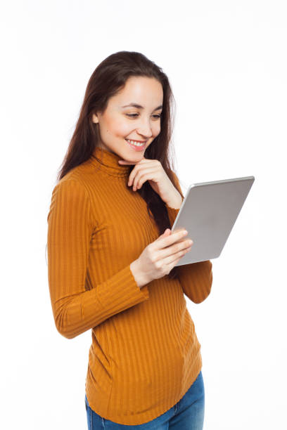 istock Smiling woman and digital tablet 679298580