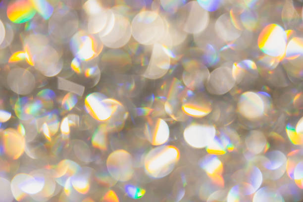 istock blur bokeh of light pearl diamond rainbow colorful brightness reflect background. 679300004