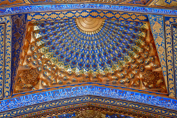 istock SAMARKAND, UZBEKISTAN - MAY 04, 2014: Ceiling of Aksaray mausoleum 679305788