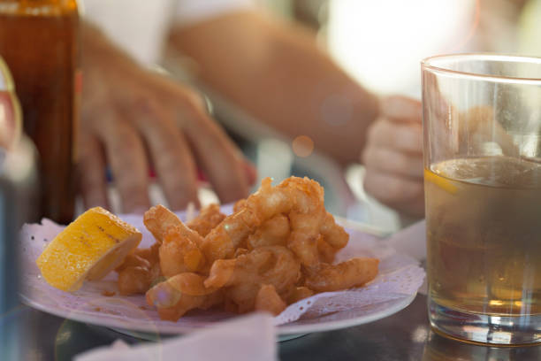 Fried Calamari on Cocktail Stick Eating Out in Spain Tapas authentic family fun in Spain