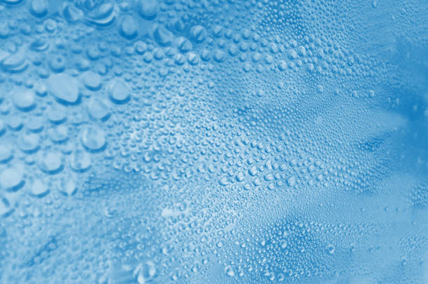 istock water condensation droplets background 679337504