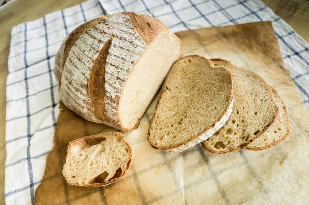 istock whole wheat bread slided on table with tablecloth, food close up 679358178