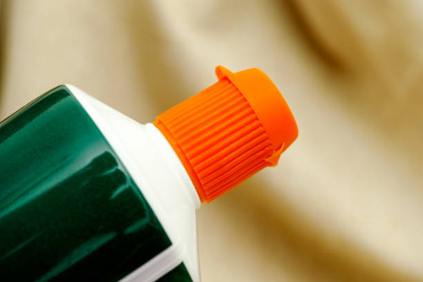 istock Closed orange cap of toothpaste tube 679358244