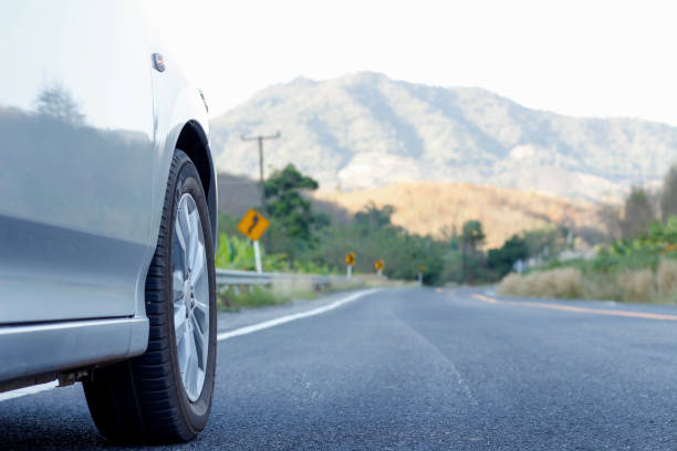 istock car and street with mountain landscape 679365690