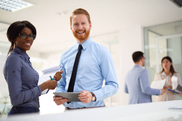 istock Teamwork and technology - Invaluable to modern business 679386280