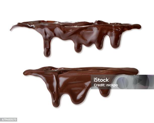 Melted Chocolate Closeup Isolated On White Background Stock Photo - Download Image Now