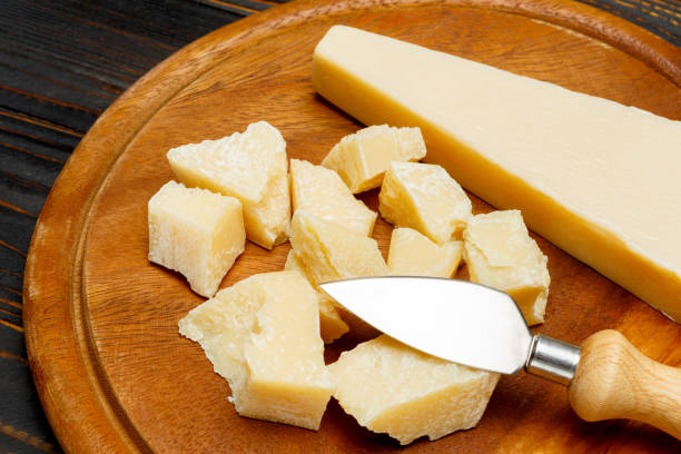 istock parmesan cheese on wooden background 679422116