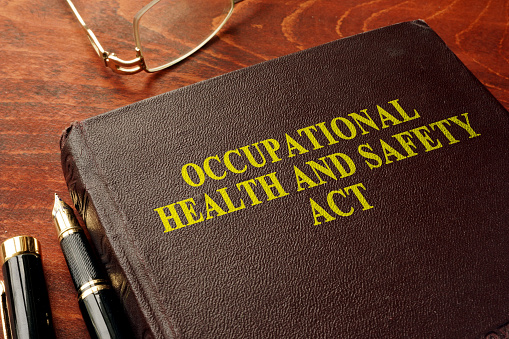Seguridad y salud ocupacional título actuan OHSA sobre el libro. photo