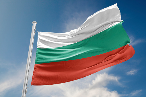 Bulgarian flag is waving at a beautiful and peaceful sky in day time while sun is shining. 3D Rendering