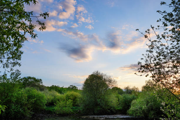 istock Beautiful sunset above rural lane. Square composition 679453068