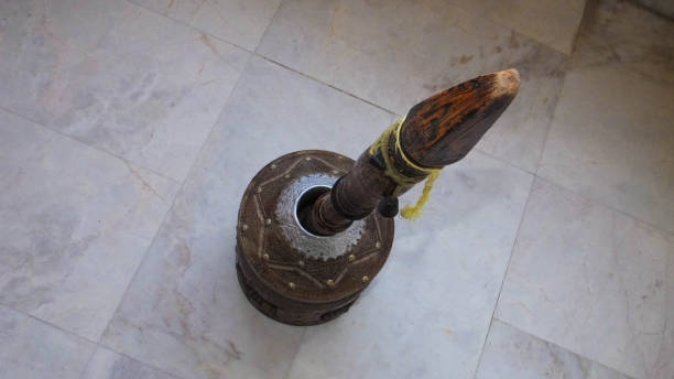 istock Old wooden seed crusher and churner . 679453334