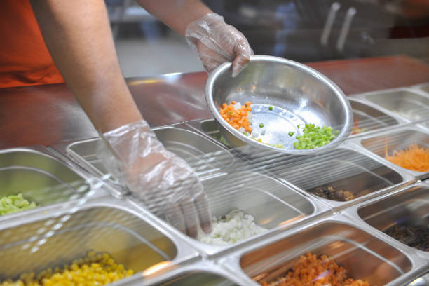istock cooking in fast food restaurant 679453706