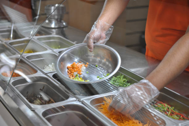 istock cooking in fast food restaurant 679457292