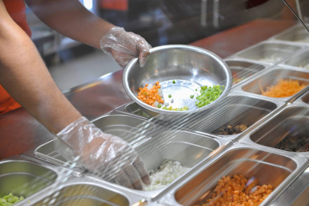 istock cooking in fast food restaurant 679460164