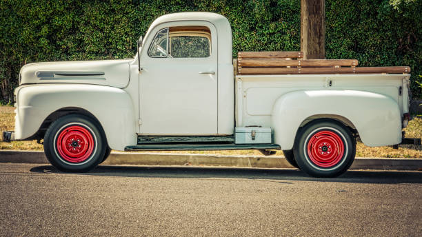 Pickup 2 A white pickup sitting on a southern California street. old truck stock pictures, royalty-free photos & images
