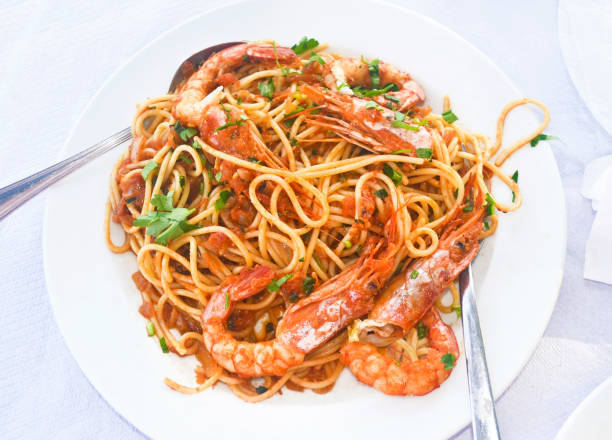 istock pasta with shrimps at a greek tavern 679461438