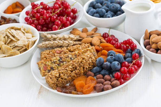 istock cereal muesli bars, fresh and dried fruit for breakfast 679462554