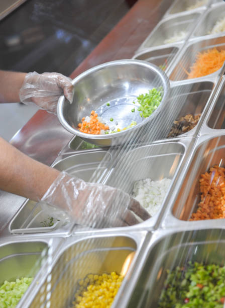 istock cooking in fast food restaurant 679463656
