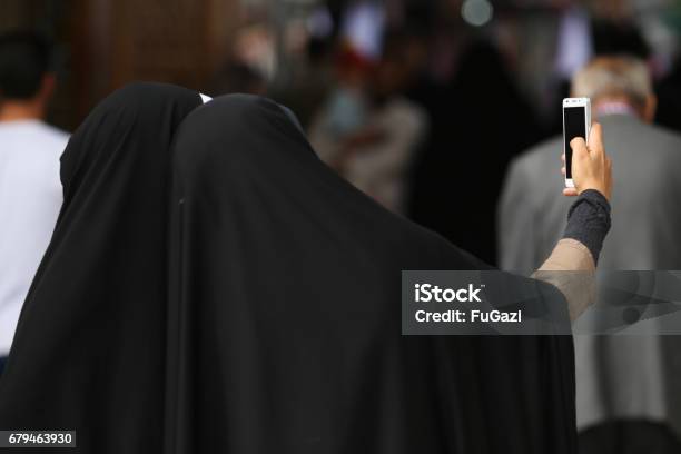 Muslim Women With Black Hijabs Posing For A Selfie In A Mosque In Qom Iran Stock Photo - Download Image Now