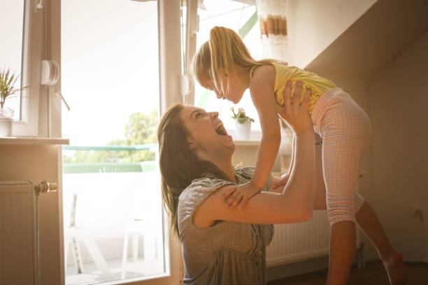 istock Single mother with her daughter at home. 679469594