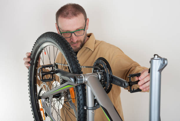 istock Bearded caucasian man repairing  the mtb bicycle 679484084