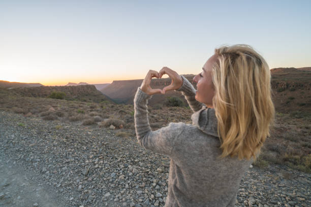 istock Young woman framing nature 679486300