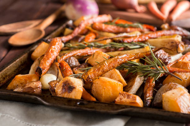 Roasted Root Vegetables Roasted Root Vegetables -- Carrot, Turnip, Rutabaga, Parsnip, Shallot roasted stock pictures, royalty-free photos & images
