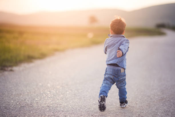 istock Playful boy on the road 679494870
